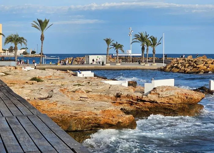 аcogedor De Dos En * Torrevieja